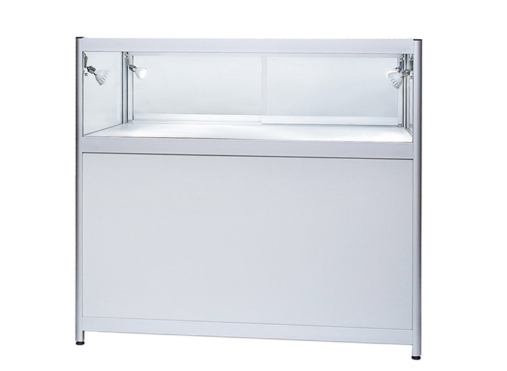 Glass display counter with lockable doors
